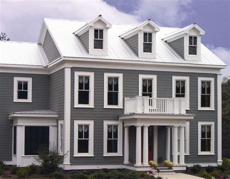 gray brick house with white metal roof|brick house metal roof colors.